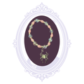 Pink and iridescent beaded stretch bracelet with silver-tone accents and dangling spider charm, hand-assembled by Mrs. Bones.