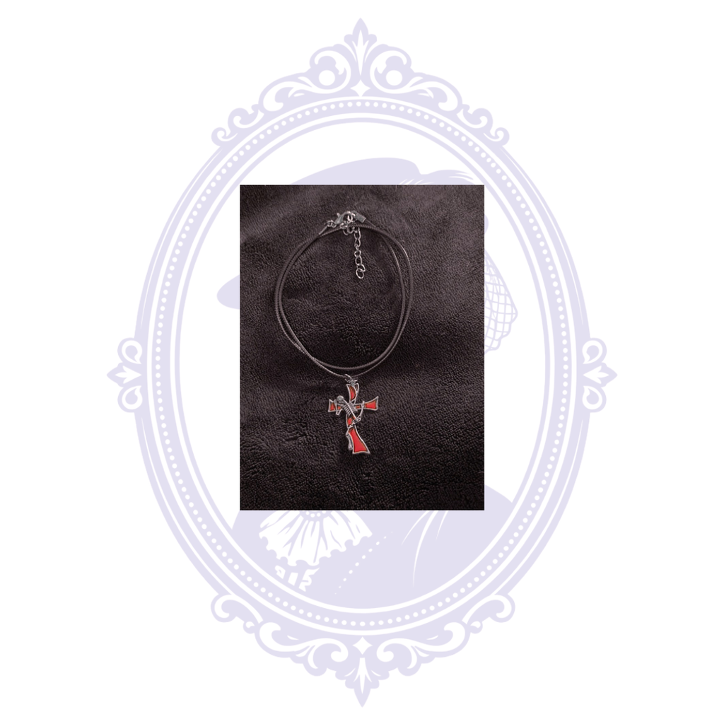 Full view of skeleton guitarist pendant necklace with double black cord and adjustable extender chain.