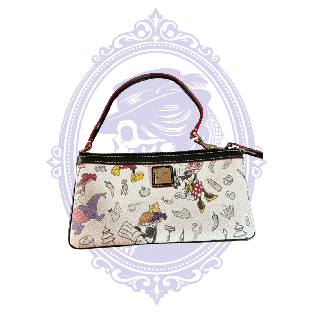 Close-up of Disney Food and Wine wristlet and leather carry strap
