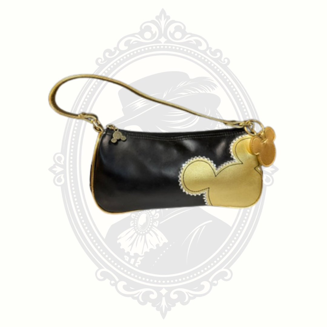 Disney Store black and gold wristlet purse with metallic Mickey Mouse silhouette design on front
