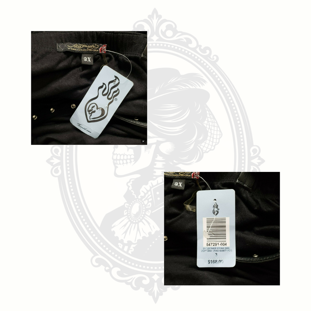 Interior Ed Hardy clothing tag and branding detail inside black skull dress.