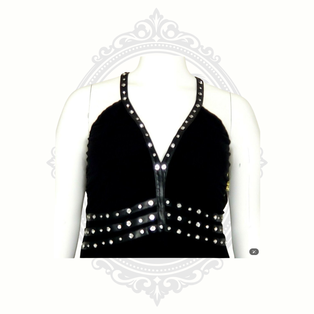Close-up of rhinestone neckline detailing on black Ed Hardy skull dress.