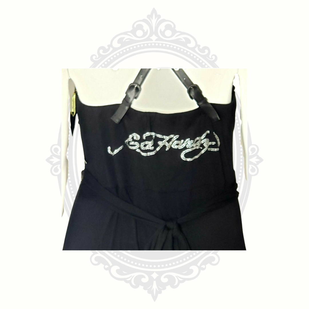 Back logo detail featuring rhinestone Ed Hardy script branding on black dress.