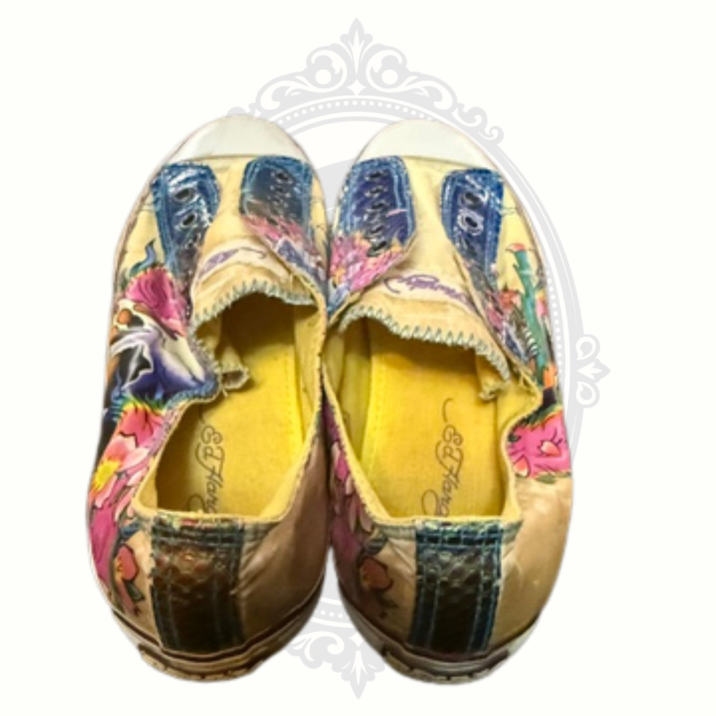 Top view of Ed Hardy slip-on sneakers with colorful skull and tattoo-style graphics