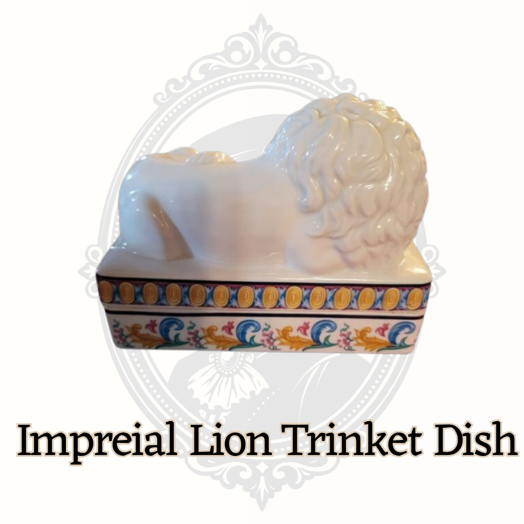 Back view of ceramic Elizabeth Arden lion trinket dish showing sculpted lion