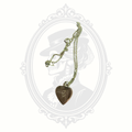Vintage style engraved heart pendant necklace with initial E on gothic Victorian background