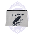 F-CAW-F raven wristlet makeup bag with black crow perched on a bare branch