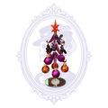 A small decorative Halloween tree with a orange star topper, purple ornaments, and orange baubles, displayed against a pale ornate oval background with a skull illustration.
