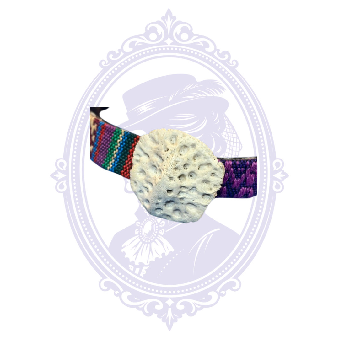 Close-up of genuine alligator scute on colorful woven bracelet