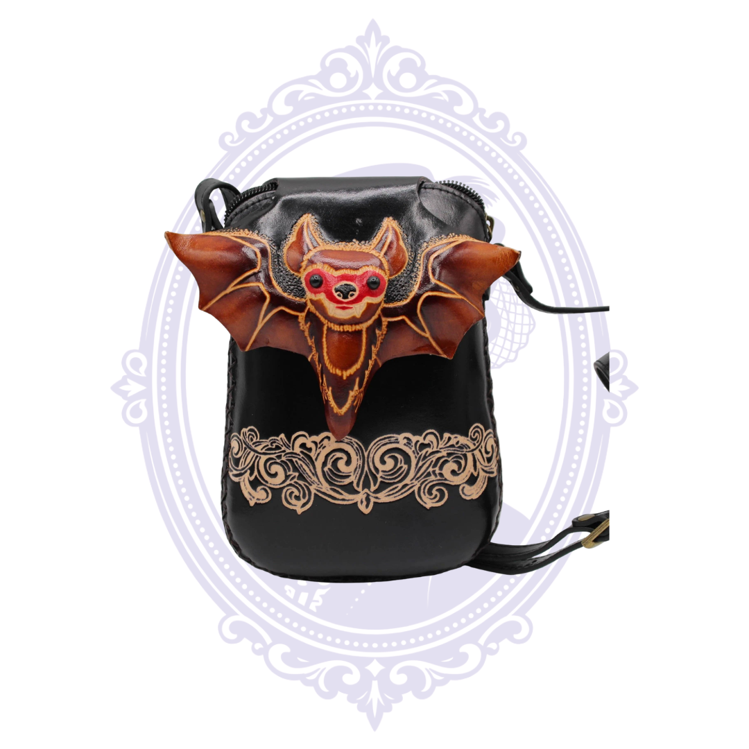 Black genuine leather bat crossbody phone pouch with dimensional brown leather bat and decorative tooled detailing