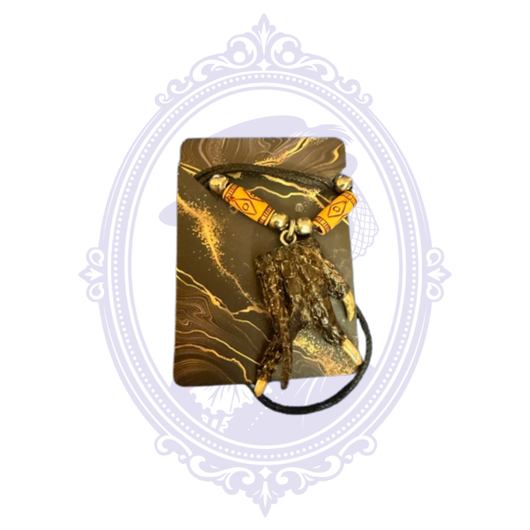 Genuine Louisiana alligator foot necklace with decorative beads and natural scales