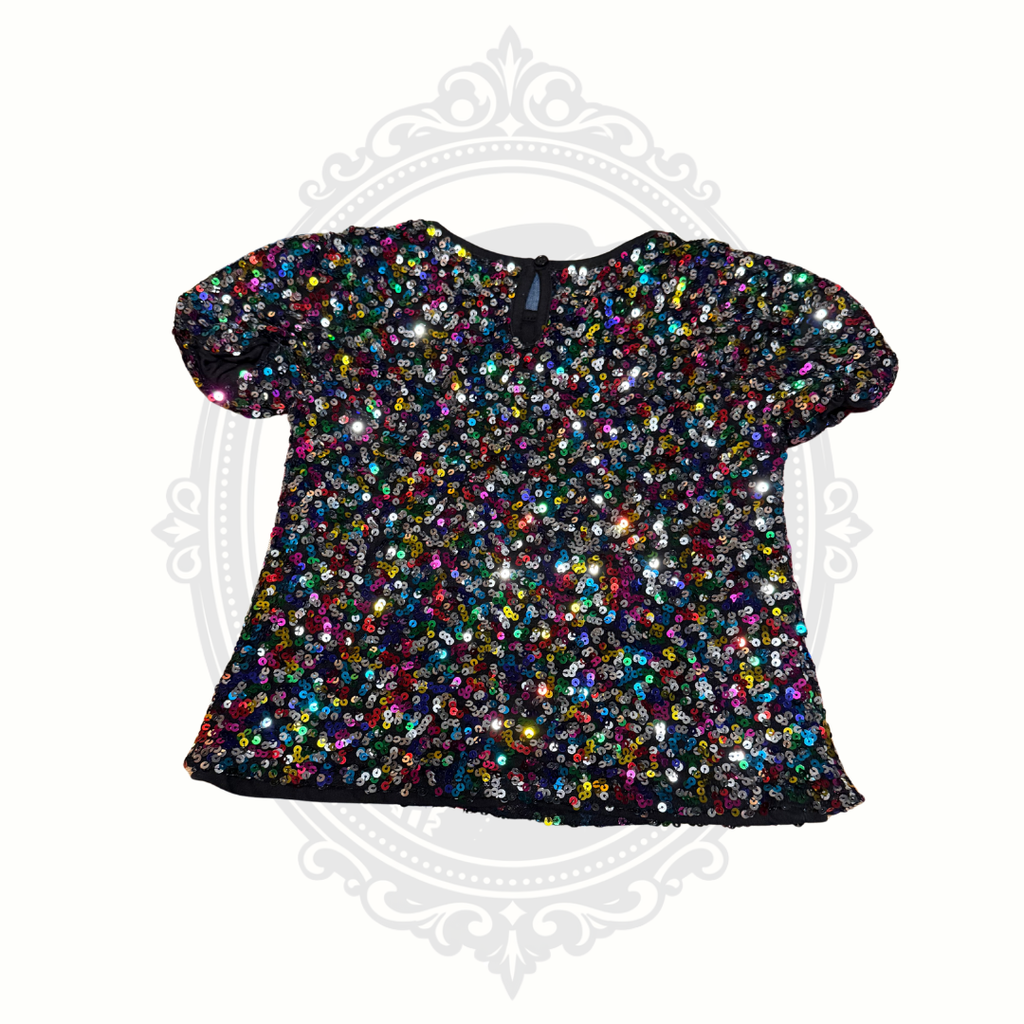 Back view of girls sequin top showing keyhole button closure
