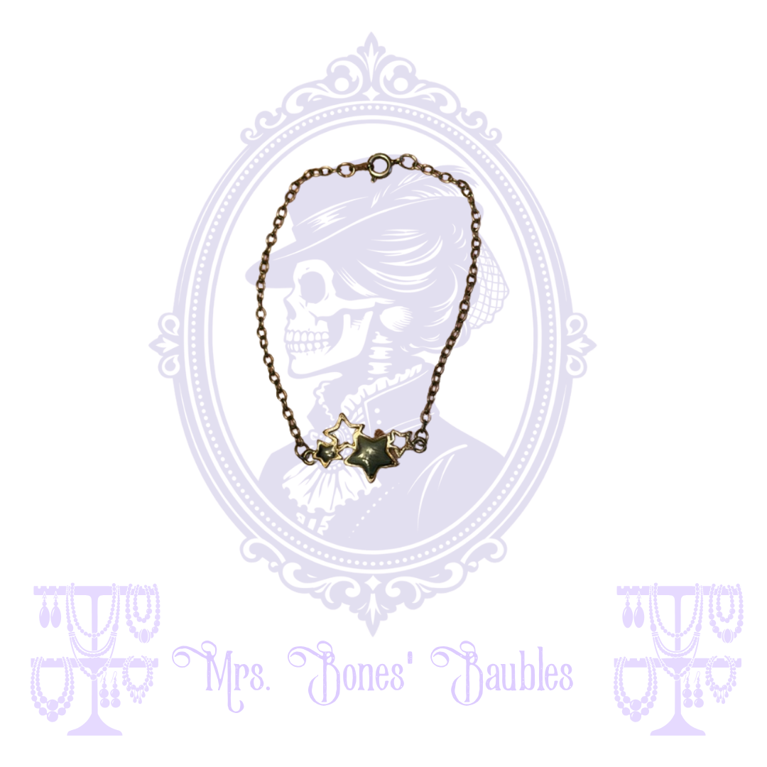 Gold-tone star cluster chain bracelet from the Mrs. Bones' Baubles collection