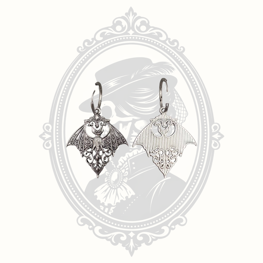 Front and back view of the Gothic bat huggie earrings showing decorative reverse.