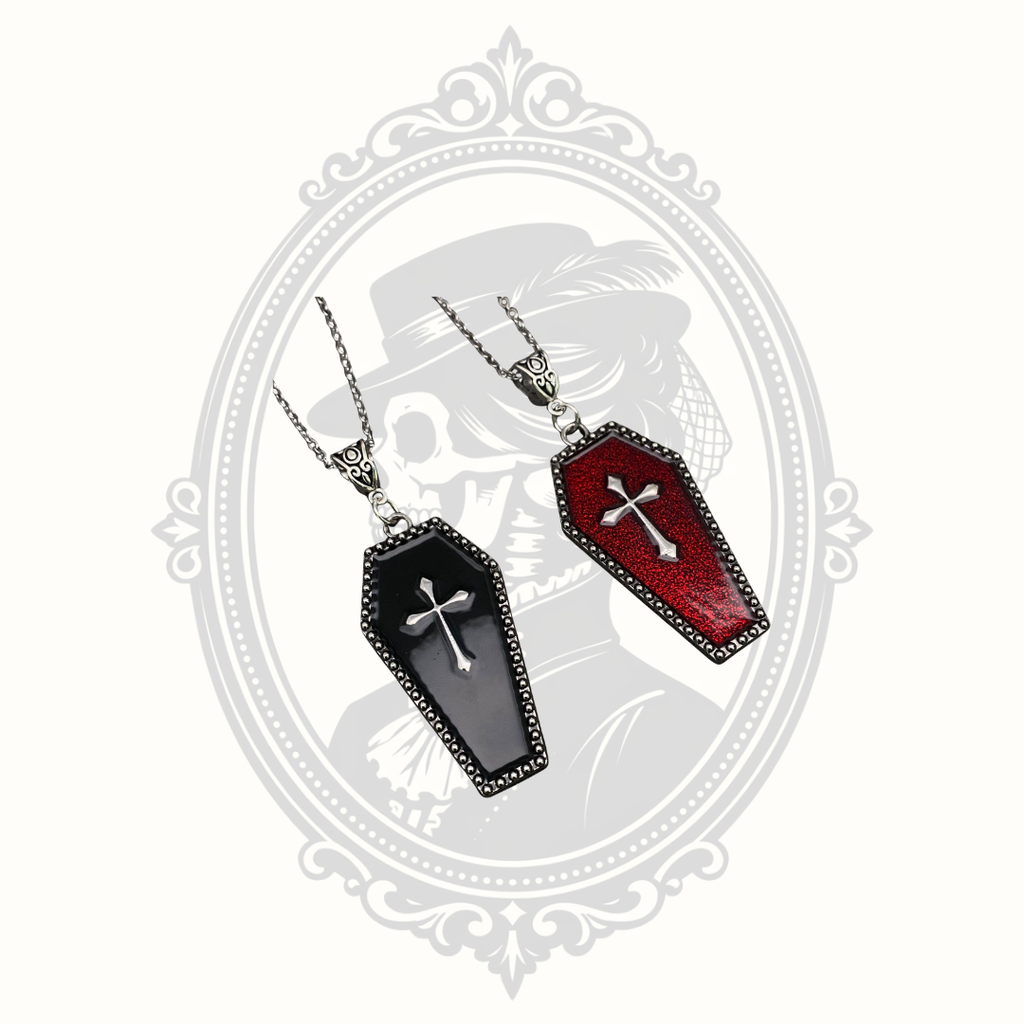 Black and red Gothic coffin cross pendant necklaces displayed together.