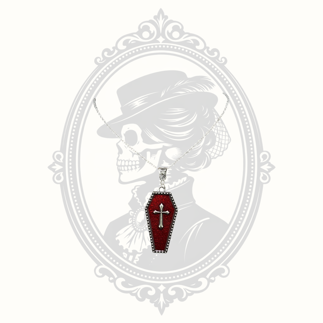 Red enamel Gothic coffin pendant necklace with raised silver-tone cross.
