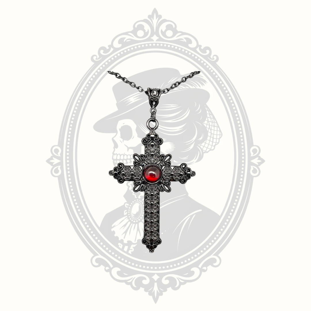 Close-up of antique gunmetal Gothic cross pendant.