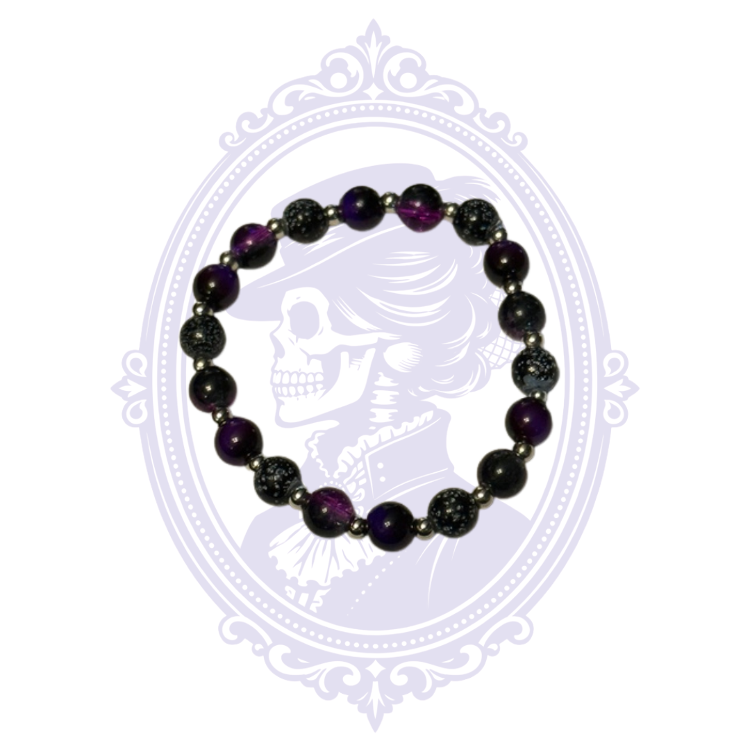 Gothic purple and black glass bead stretch bracelet hand-assembled by Mrs. Bones.