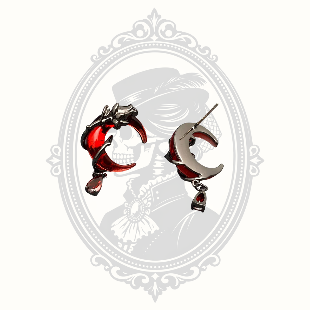 Back view of gothic red crescent moon post earrings.