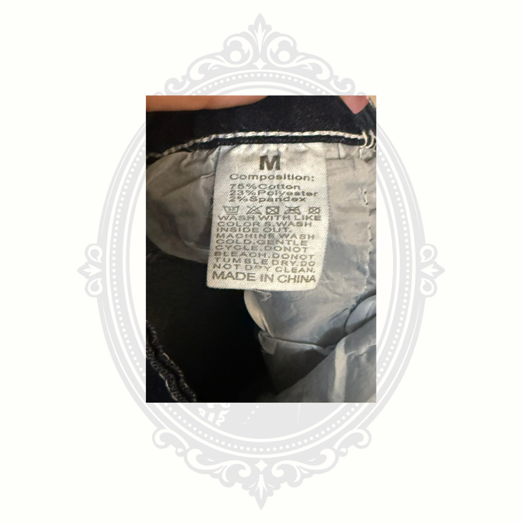 jeans fabric tag showing cotton polyester spandex blend made in China