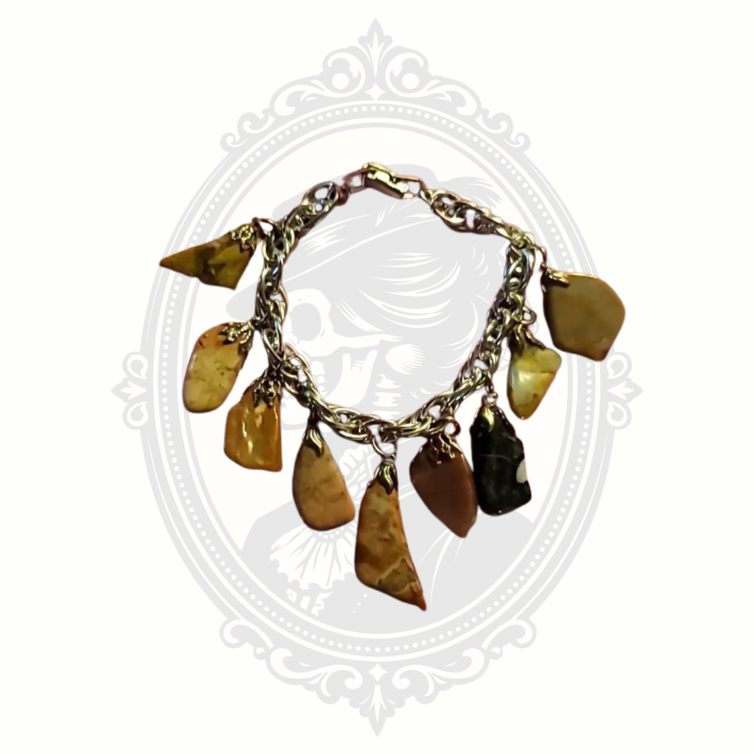 handmade natural stone nugget bracelet with polished stones and dangling charm design