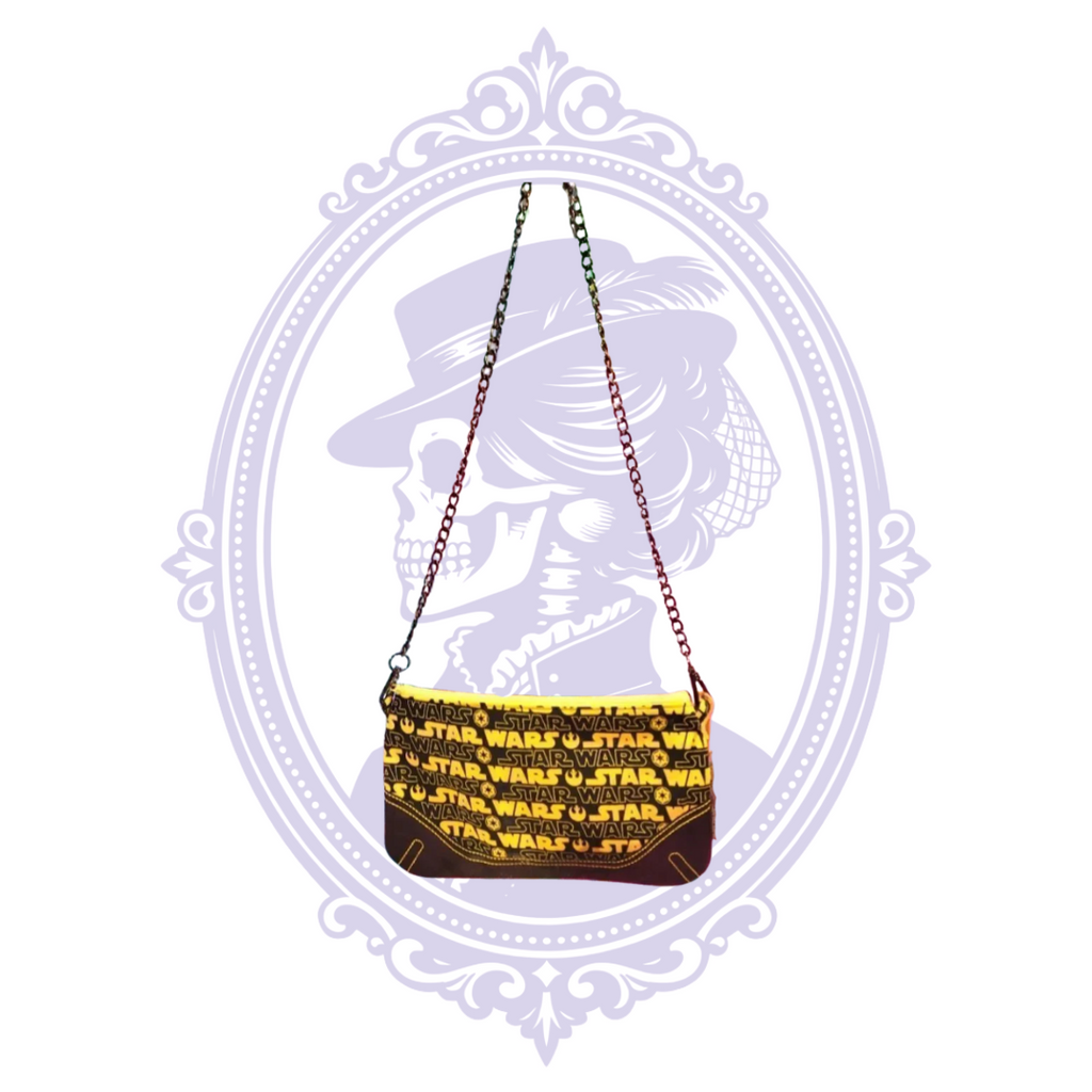 Handmade Star Wars crossbody purse with detachable chain strap and black and yellow logo pattern