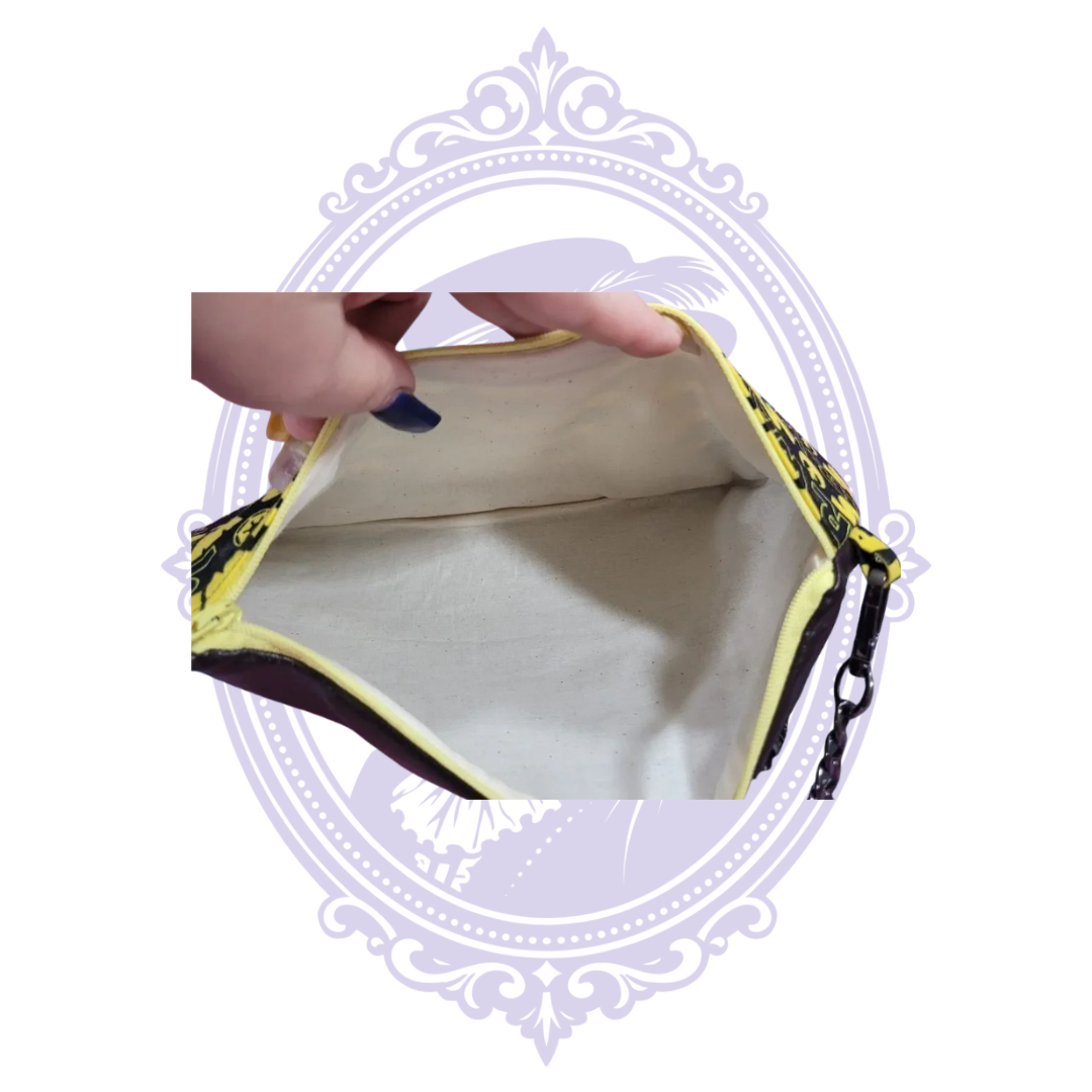 Open interior of handmade Star Wars crossbody bag showing light-colored cotton lining and yellow zipper
