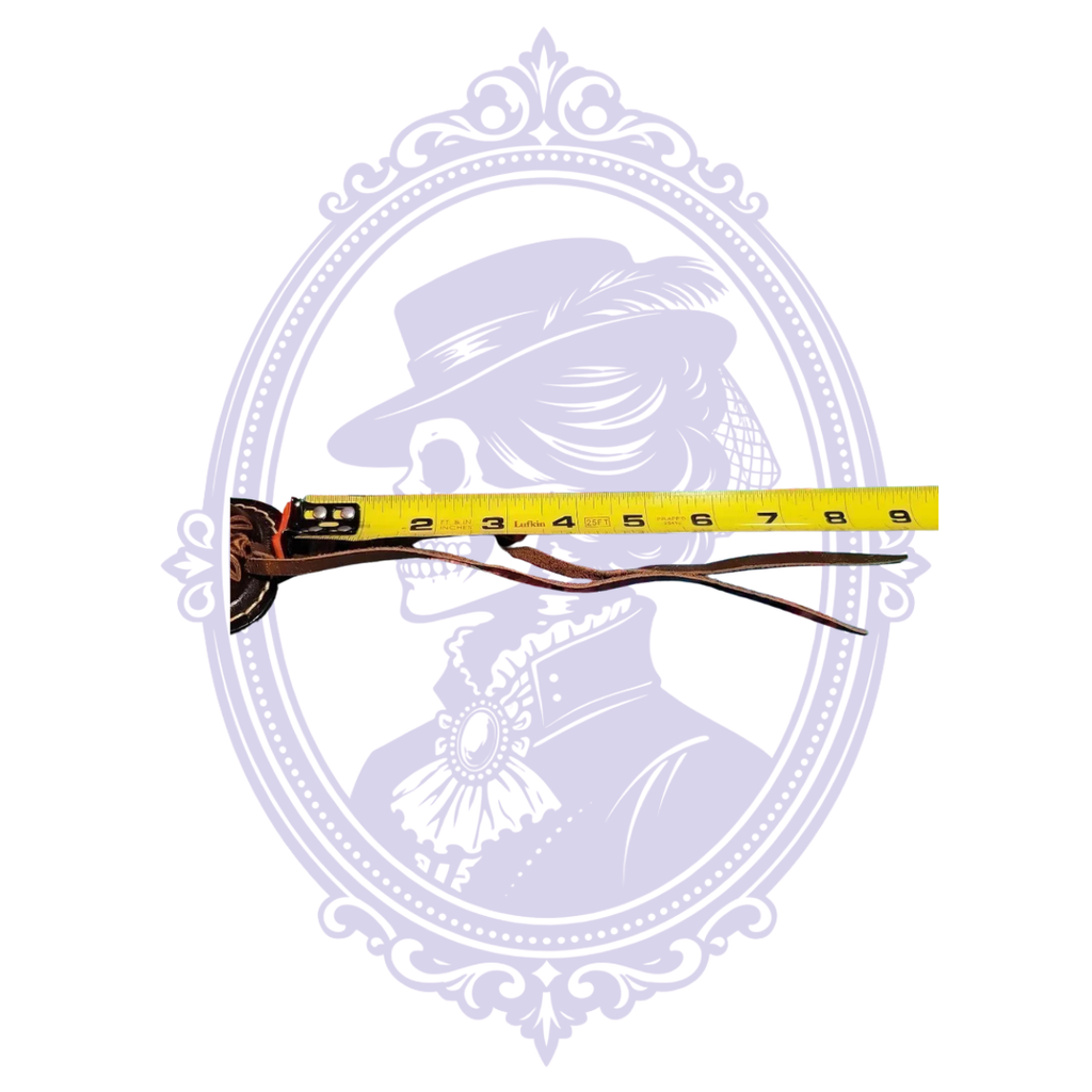 Leather ties shown beside measuring tape