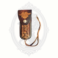 Harley Davidson leather knife sheath with winged logo and laced tooled front, vintage new old stock