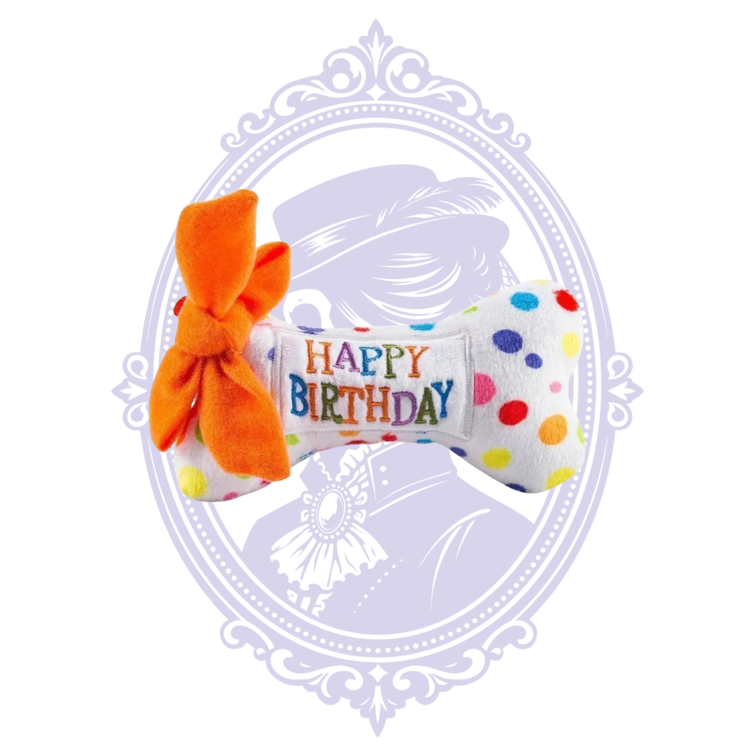 Happy Birthday embroidered side of plush bone with orange bow