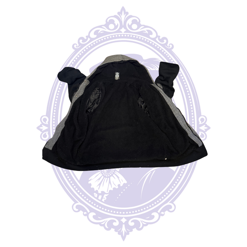 Inside-out view of HAWK boys Large hooded varsity jacket showing soft textured black polyester lining and inside construction.