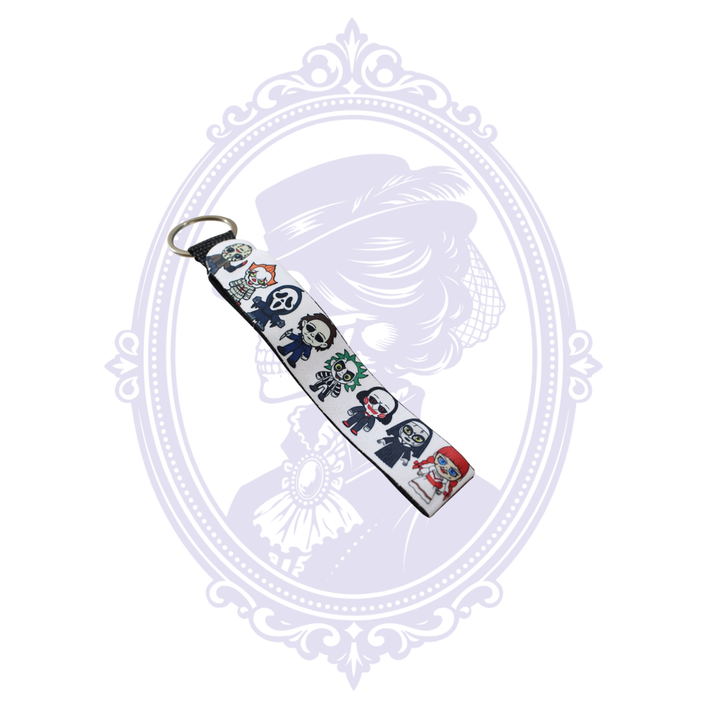 Neoprene wristlet keychain featuring a lineup of colorful cartoon-style horror movie characters