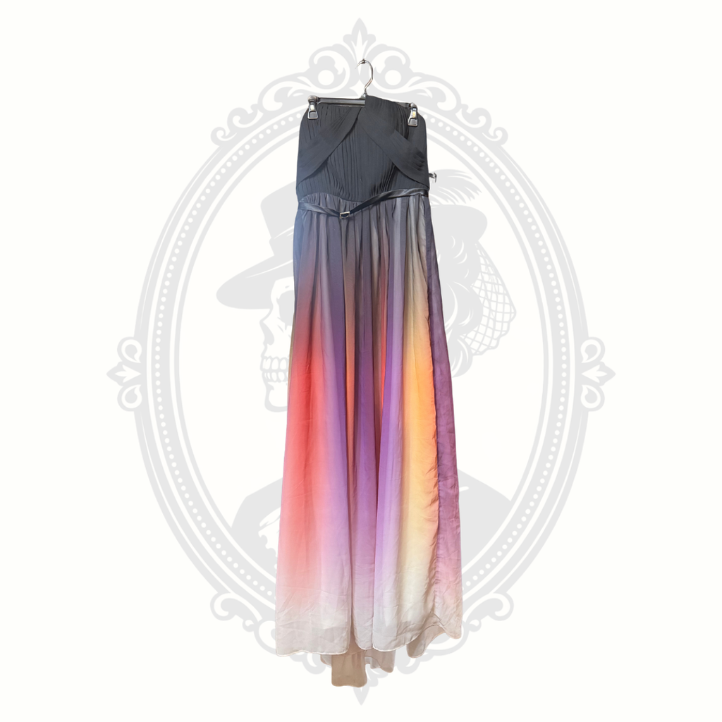 Gradient dress with black top and colorful skirt on a white background