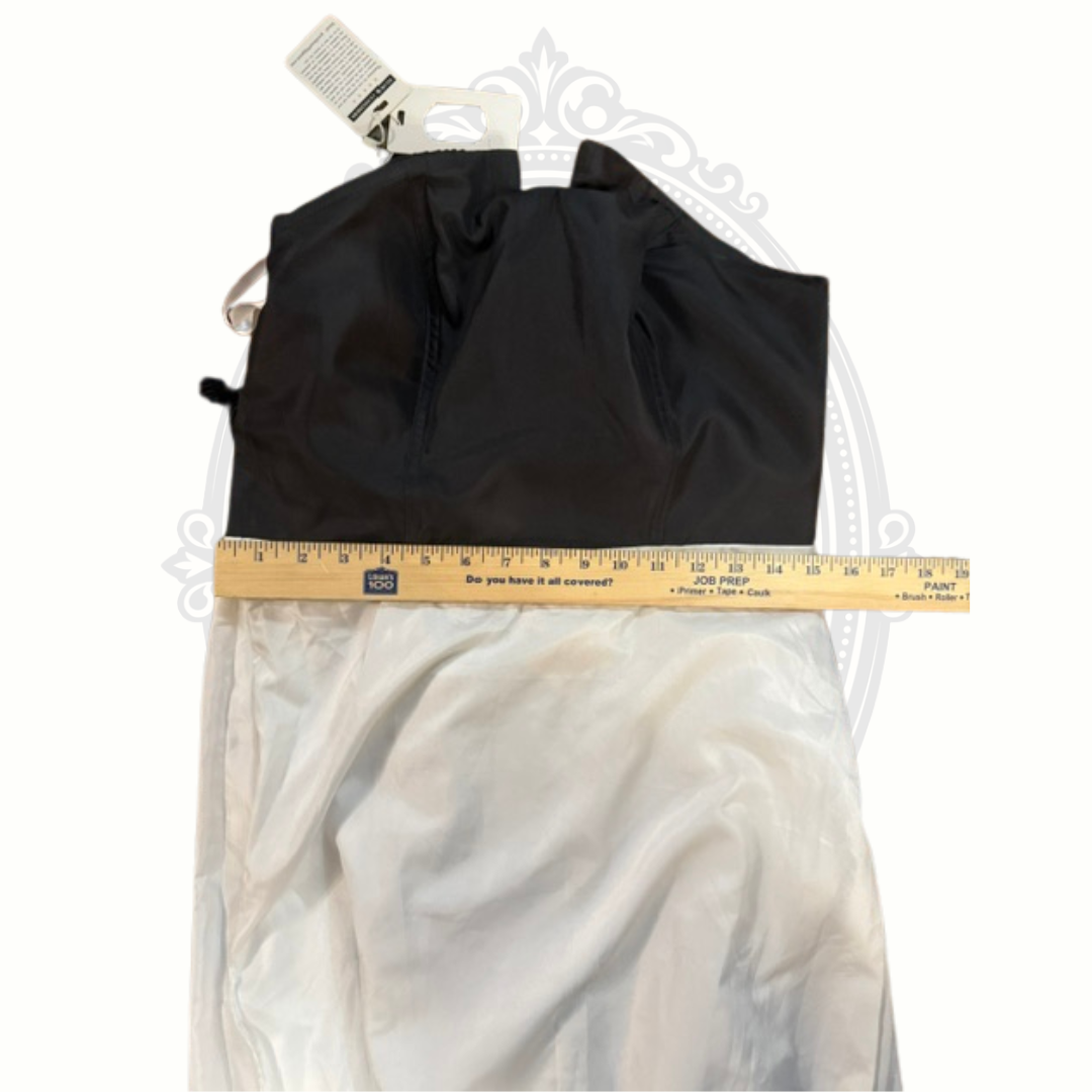 Black drawstring bag with a measuring tape on a white background