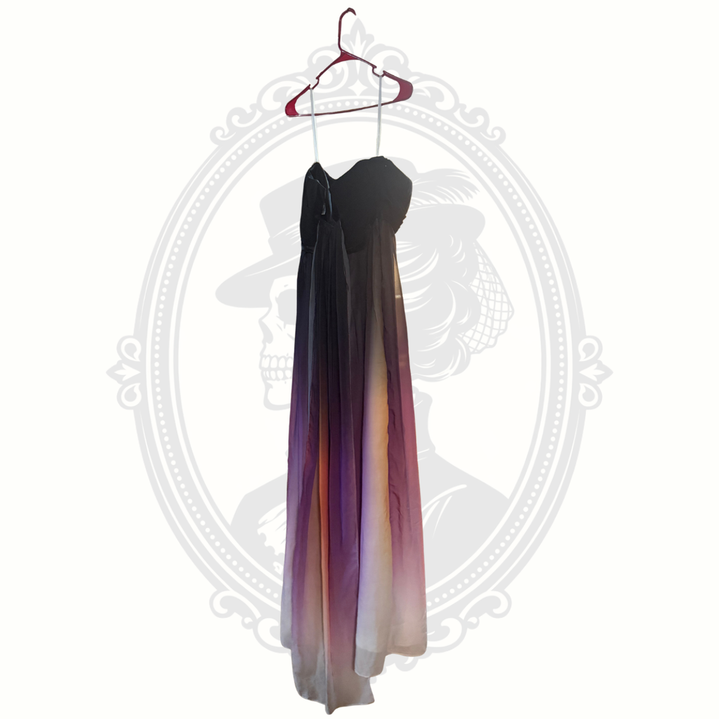 Gradient dress on a hanger with decorative white frame
