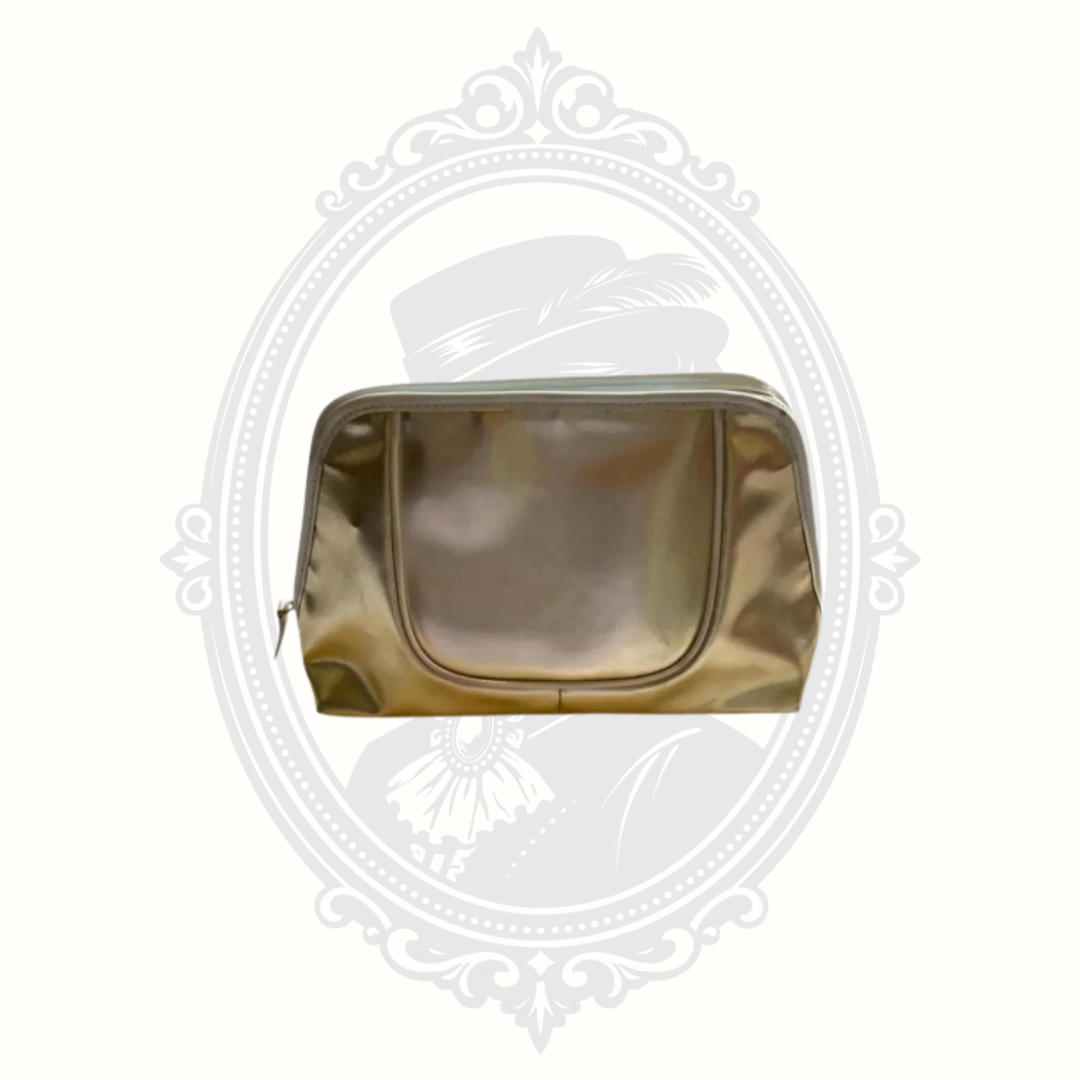 Front pocket detail of gold Lancôme cosmetic bag with metallic finish and zippered storage.