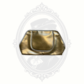 Front view of metallic gold Lancôme makeup bag with structured cosmetic pouch design.