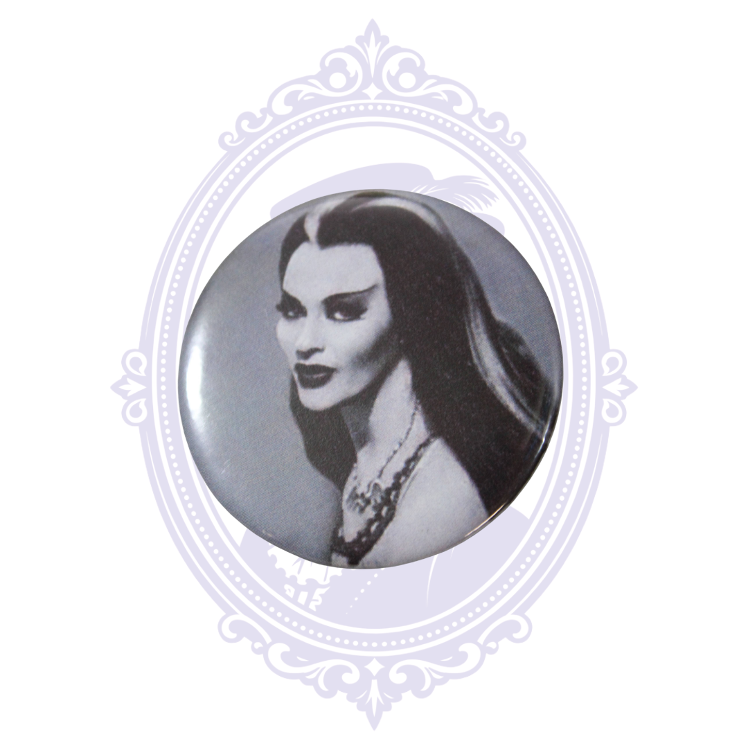 Lily Munster 2.25-inch pin button featuring a classic black-and-white portrait