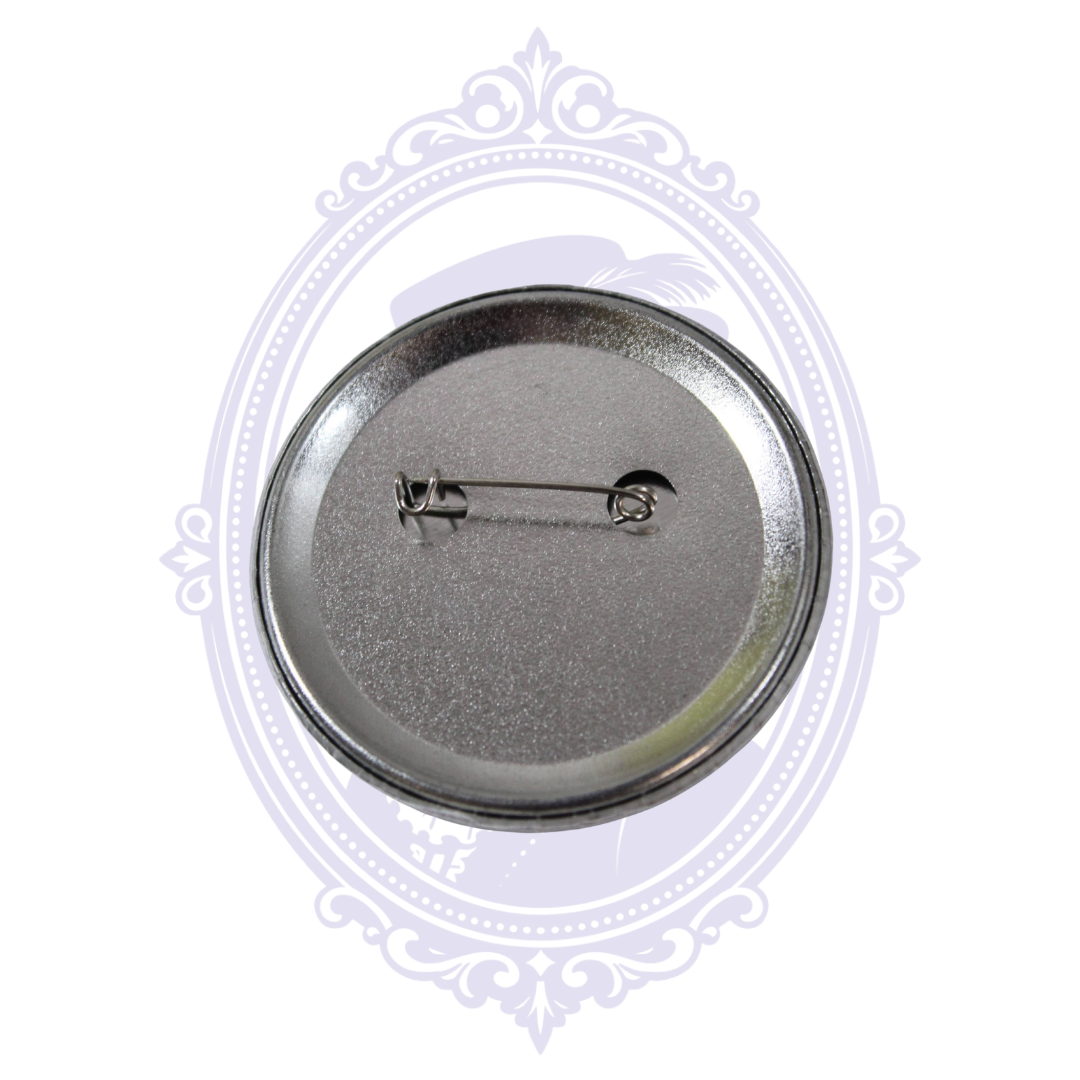 Back of Lily Munster 2.25-inch metal-backed pin button showing traditional pin closure