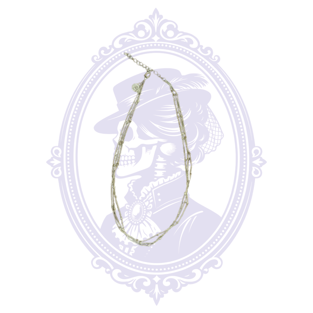 Liz Claiborne silver-tone multi-strand chain necklace shown full length with adjustable extender.