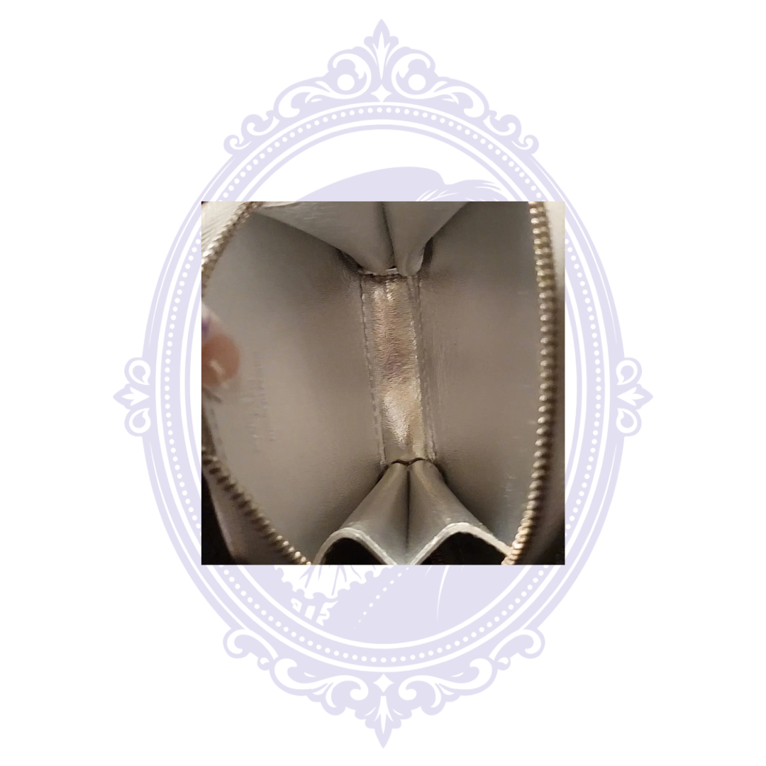 Interior view of Louis Vuitton Porte-Monnaie Flocon MM Argent coin pouch