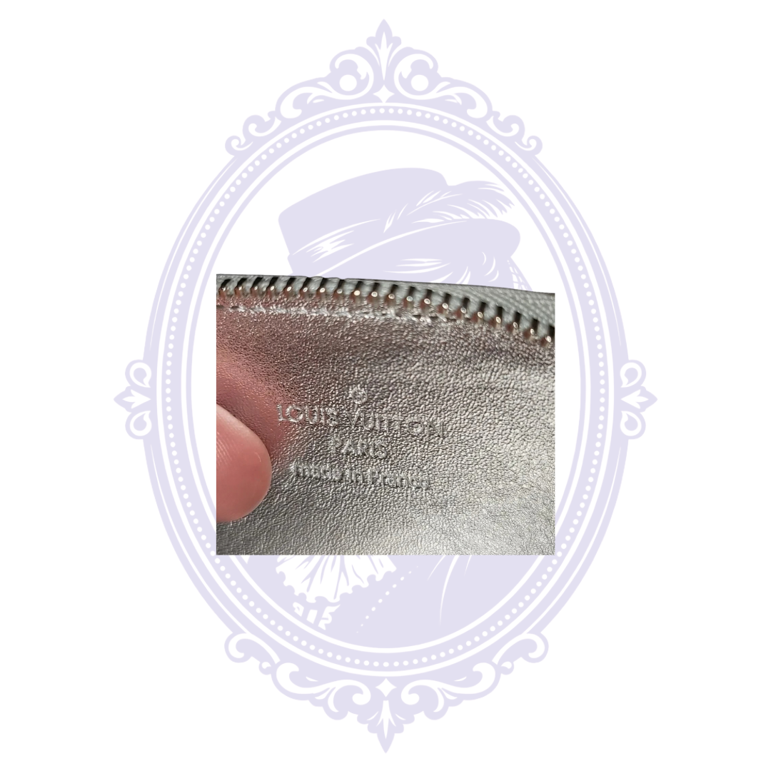 Louis Vuitton Paris Made in France interior stamp inside Porte-Monnaie Flocon MM