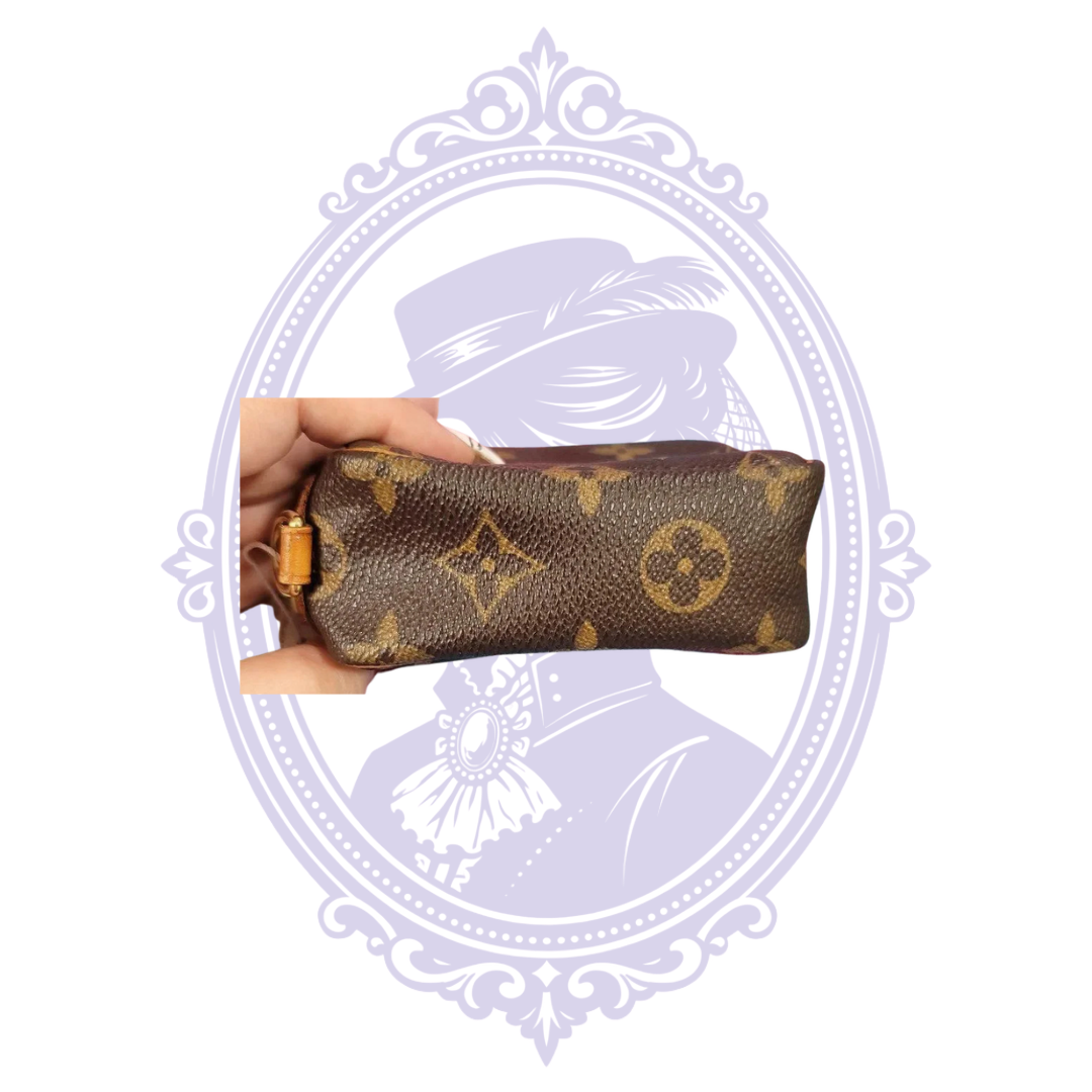 Louis Vuitton Monogram Wapity pouch, view 3 showing monogram canvas, trim, zipper, red interior or authentication tag