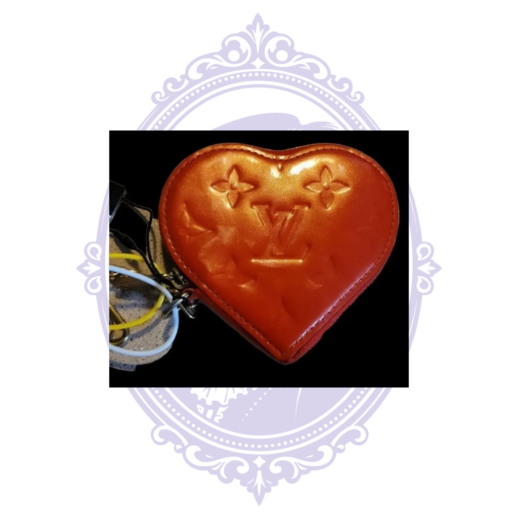 Louis Vuitton Orange Sunset heart purse interior stitching detail
