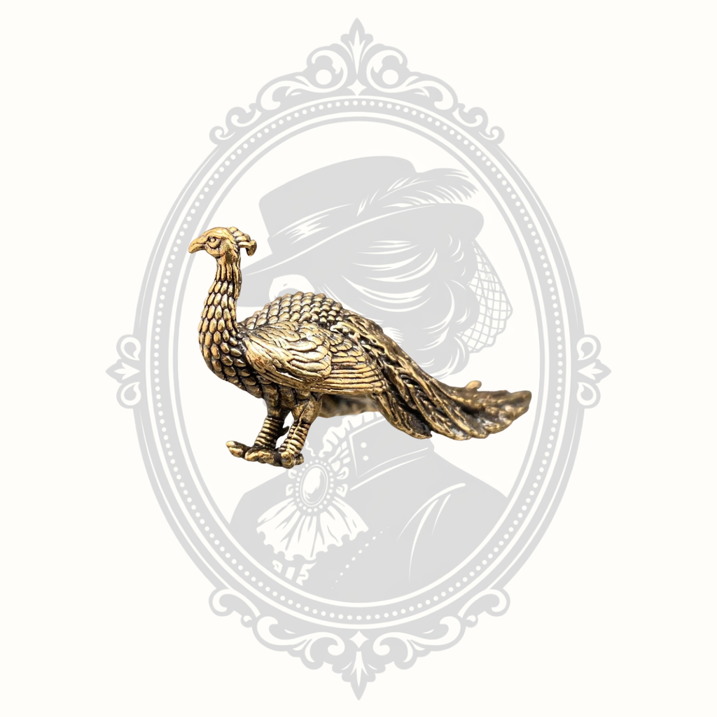 Side profile of the detailed brass peacock figurine.
