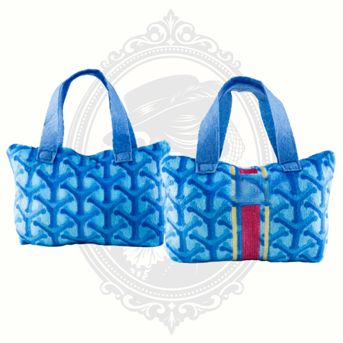 Blue patterned plush dog toy handbag with soft handles and textured fabric design