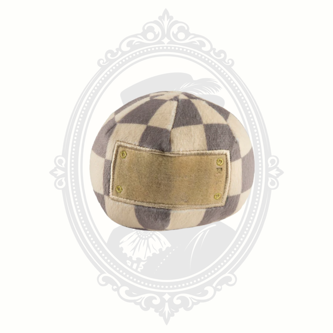 Checkered plush ball-style dog toy with soft fabric and decorative patch detail