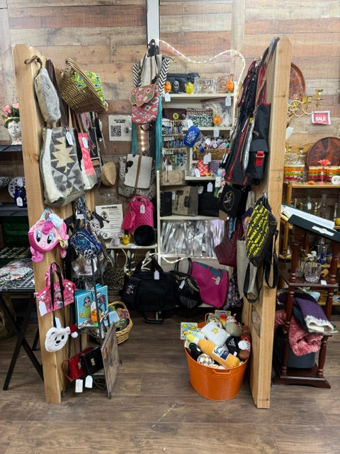 Mrs Bones Curio Cupboard booth walkway inside Treasure Trove Fleatique with curated displays