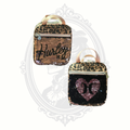 Hurley flip sequin leopard mini backpack front view of flipped and flipped with pink heart design