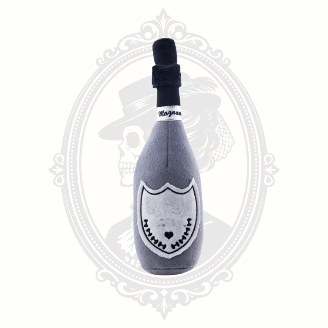 Plush champagne bottle dog toy in gray with embroidered label detail and soft squeaky design